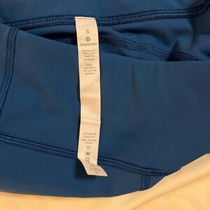 Lululemon cobalt blue thick exercise leggings.